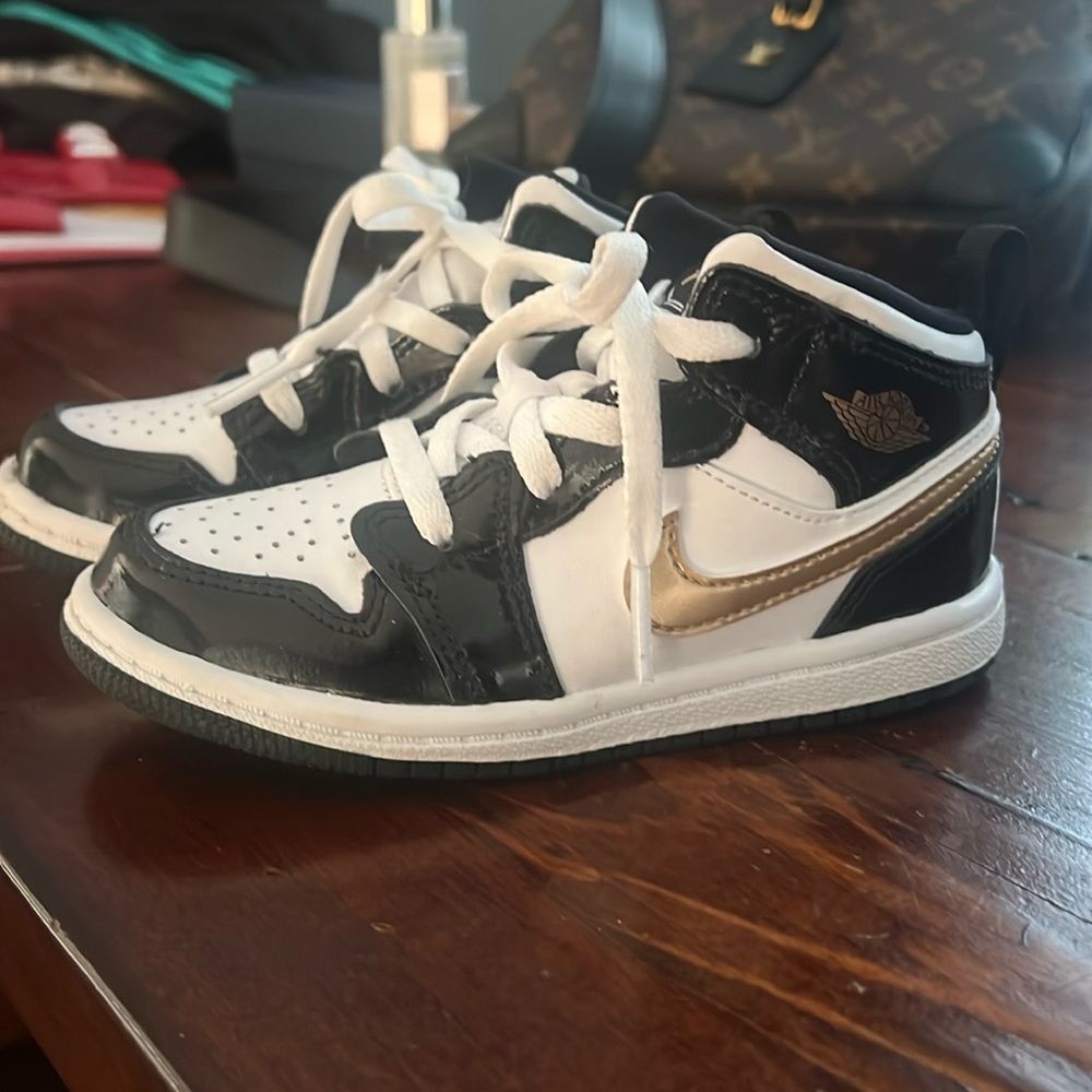 Barely worn Nike Black/Metallic Air Jordan Retro Mid